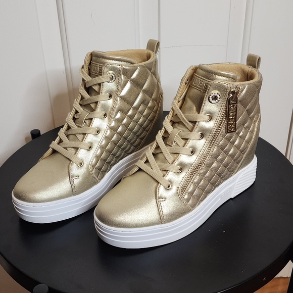 Guess Shoes - Guess gold wedge sneakers size 8